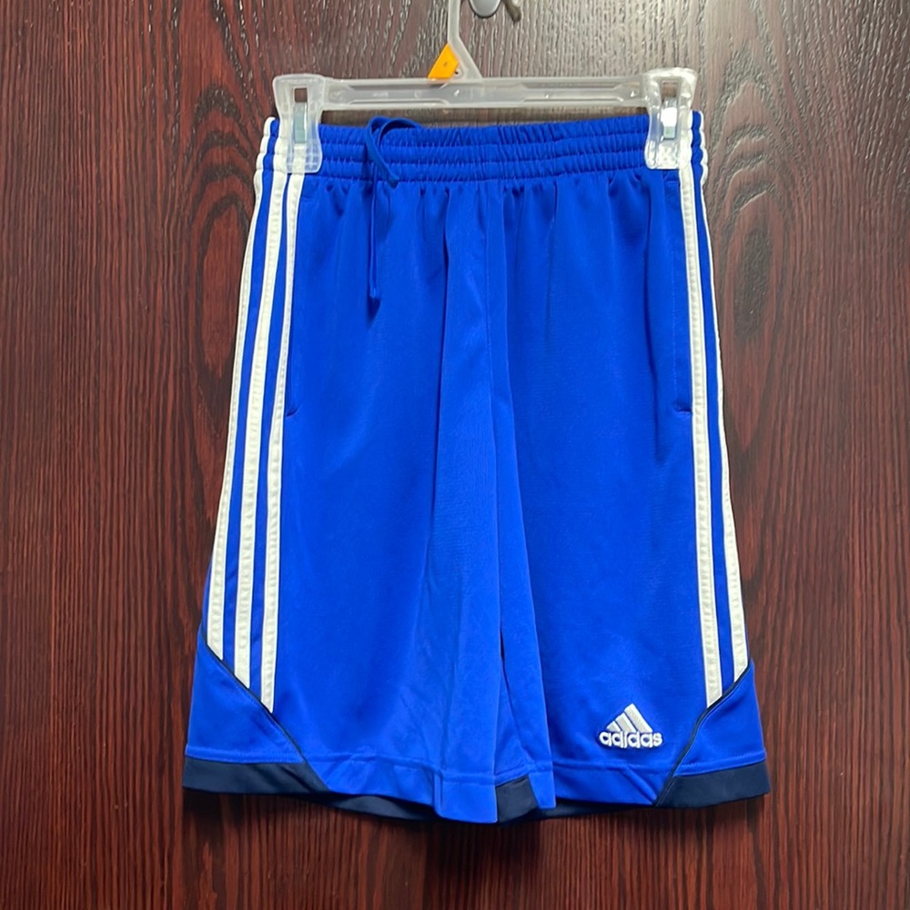 Adidas blue youth basketball shorts.